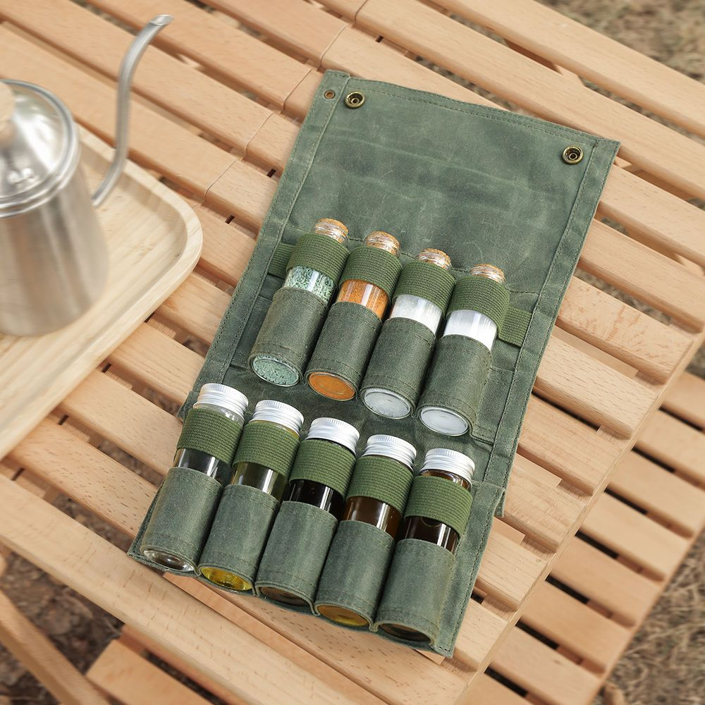b6dc90ce-9810-41e2-a1a9-c029e4ad9c80 Portable Camping Spice Set - 9 Glass Jars with Canvas Storage Bag, Travel-Friendly Seasoning Containers for Outdoor Use - Image 1